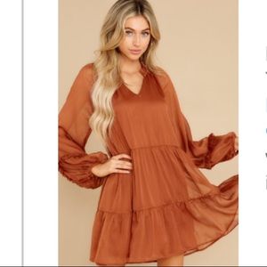 Red dress, dare to remember, golden brown dress.